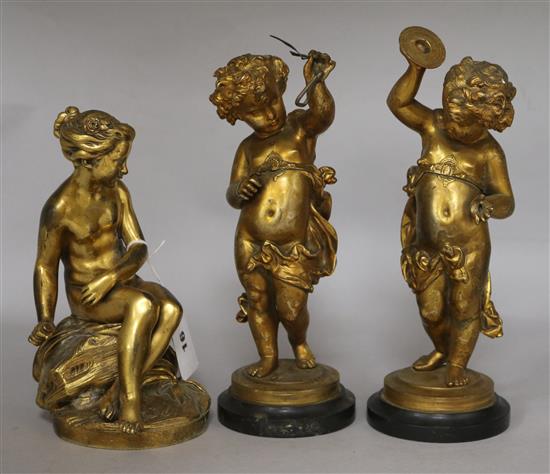 A pair of gilt bronze musicians and a gilt bronze figure of Venus